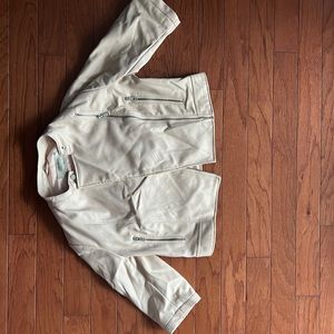 Cream color jacket as shown in the photo